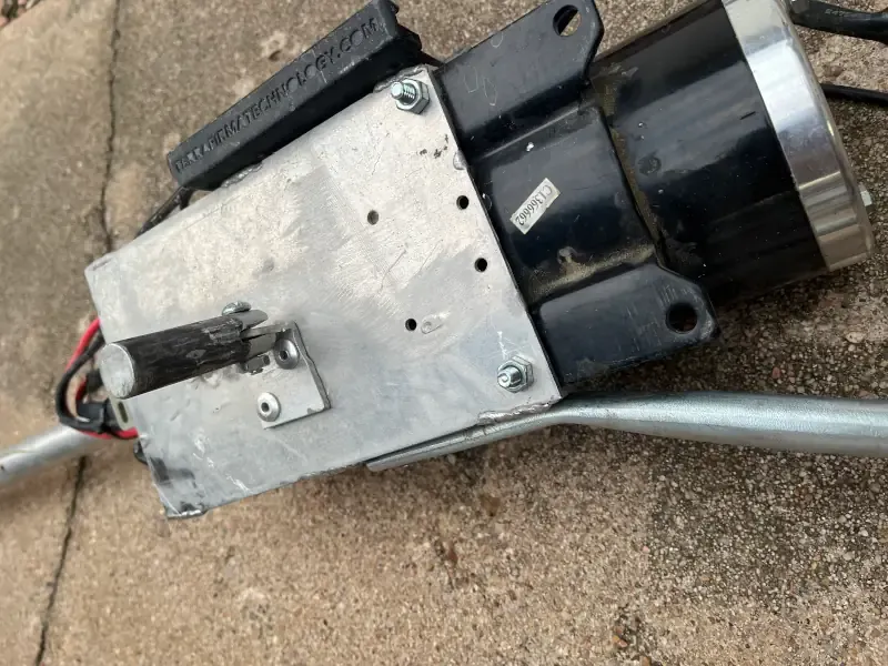 Bottom plate of the mud motor showing the mounting rod that goes into cylinder on the transom
