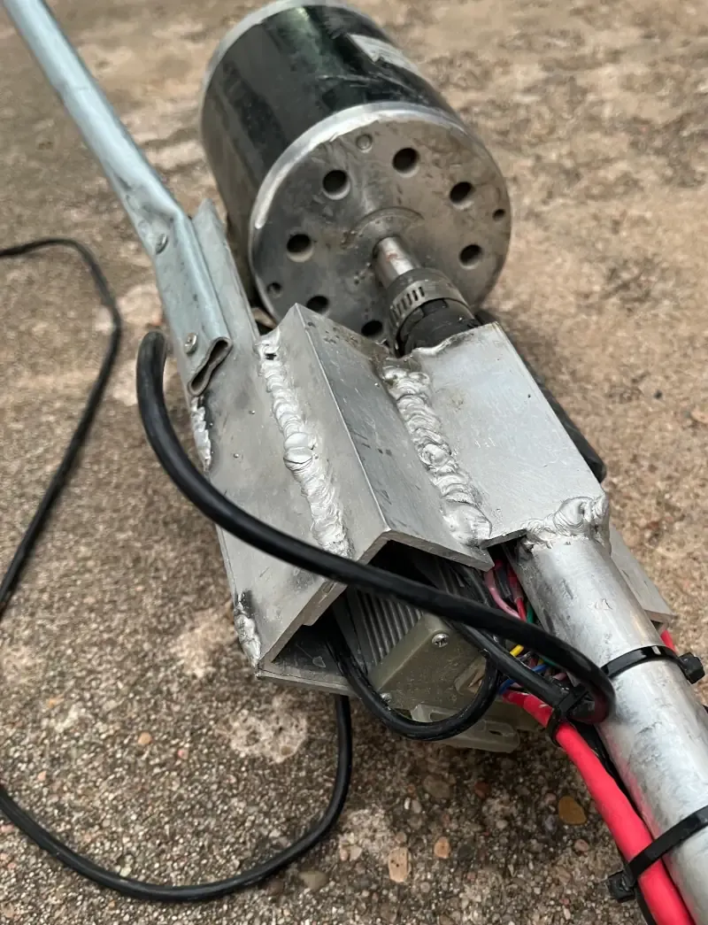 Homemade electric mud motor with the motor controller tucked into the housing of the base.