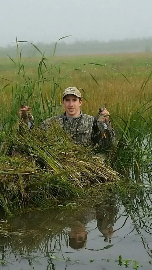 Kayak duck blind with PVC doors brushed in with camo